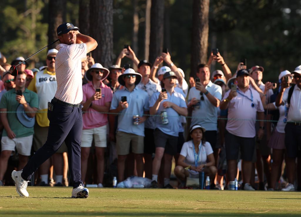 Bryson DeChambeau, who has a three-shot lead, hits a tee shot on the 16th hole during the third round of the U.S. Open.