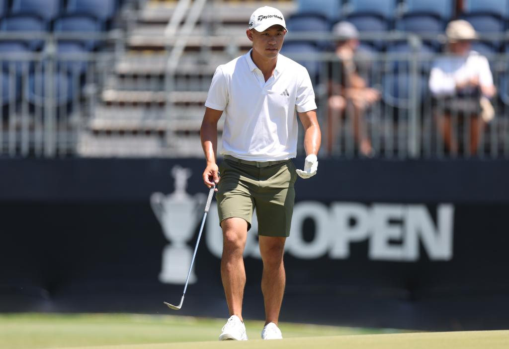 Collin Morikawa walks on the third green during a practice round prior to the U.S. Open which begins Thursday.