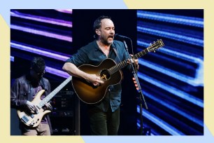 Dave Matthews sings and plays guitar onstage.
