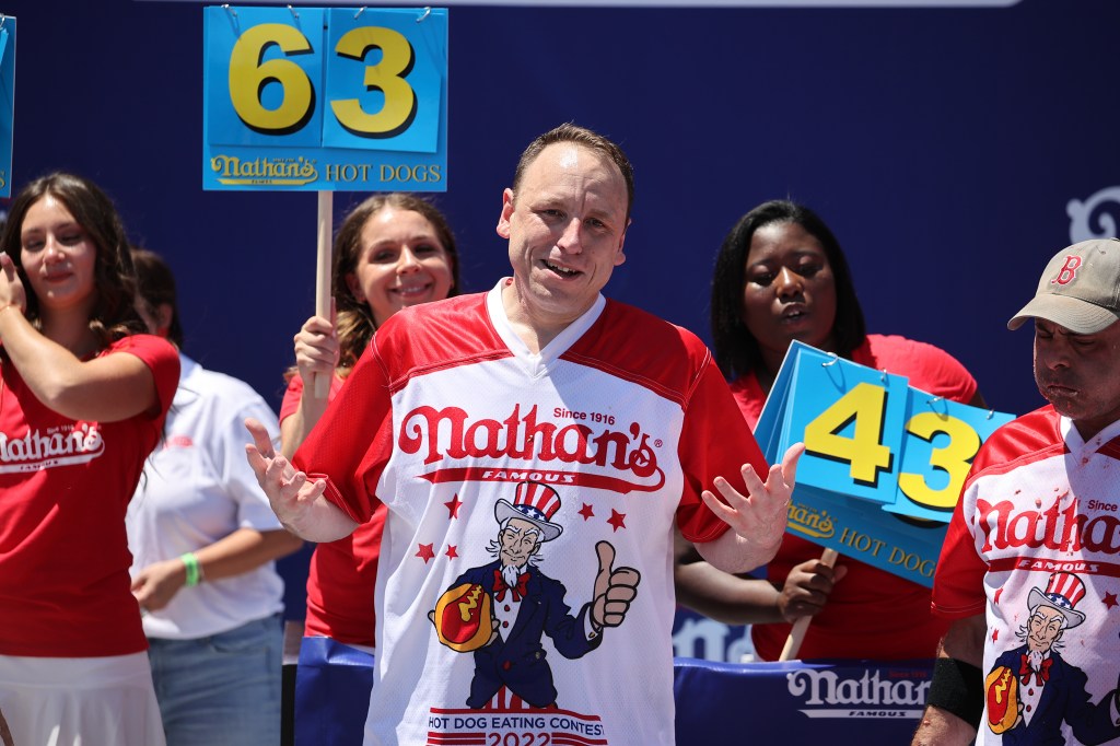 Joey Chestnut won first place eating 63 hot dogs in 10 minutes during the men 2022 Nathan's Famous International Hot Dog Eating Contest in Coney Island of the Brooklyn borough in New York City, United States on July 4, 2022. 