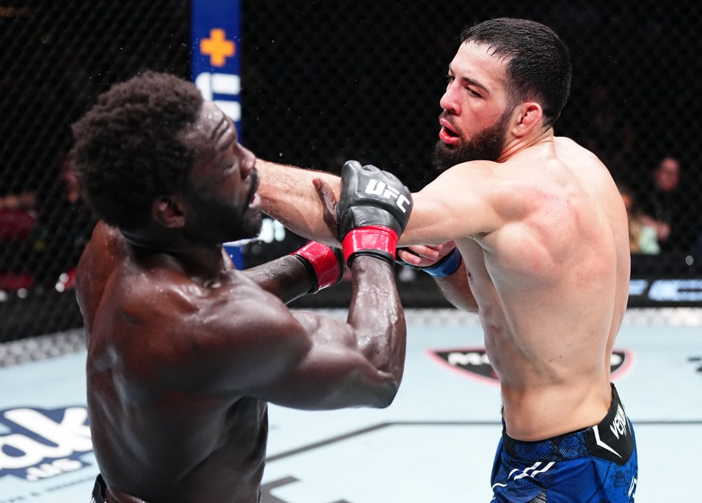 Nassourdine Imavov lands a left hand against Jared Cannonier in a middleweight fight at KFC YUM! Center on June 08, 2024.