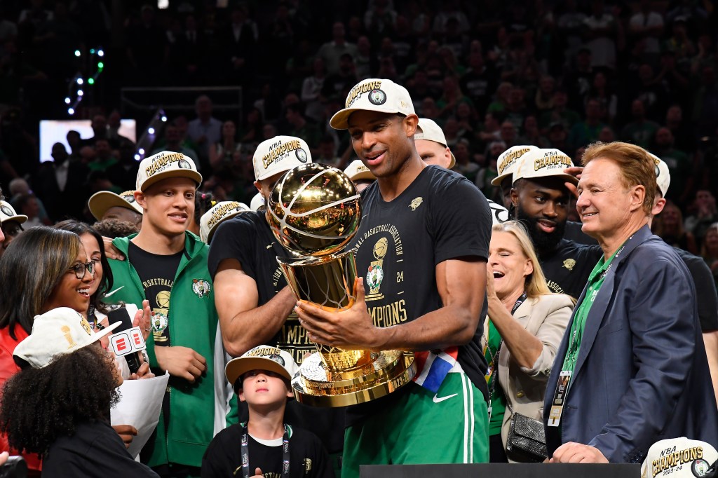 Al Horford celebrates with the Larry O'Brien Trophy after the game against the Dallas Mavericks during Game 5 of the 2024 NBA Finals on June 17, 2024 at the TD Garden in Boston, Massachusetts. 