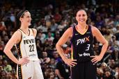 Caitlin Clark and Diana Taurasi smile during a game on June 30, 2024 at Footprint Center in Phoenix, Arizona.