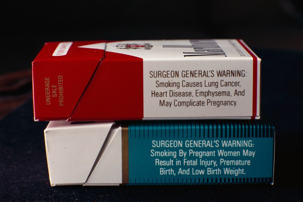 Labels on cigarette packs give the Surgeon General's warnings about the health risks of smoking.