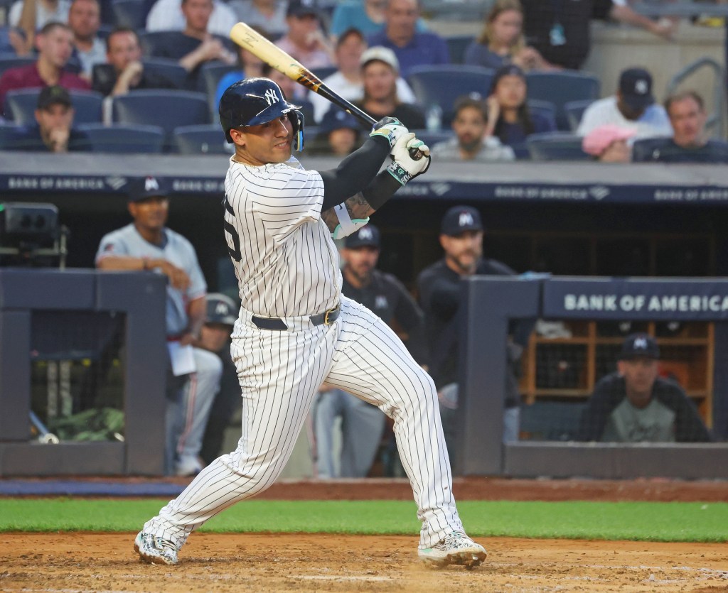 Gleyber Torres hits a two-run double in the first inning of the Yankees' win over the Twins.