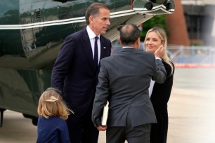 Hunter Biden and his wife Melissa Cohen Biden and their son Beau, talk with Anthony Bernal at Delaware Air National Guard Base in New Castle, Delaware, Tuesday, June 11, 2024.