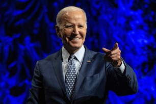 President Joe Biden points to the crowd after speaking during the League of Conservation Voters Annual Capital Dinner, at The Anthem in Washington, DC, on June 14, 2023.