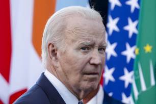 President Joe Biden attends the family photo session of G7 leaders with Pope Francis and other Heads of State and Government and international organizations on the second day of the G7 summit, in Borgo Egnazia, Apulia region, southern Italy.