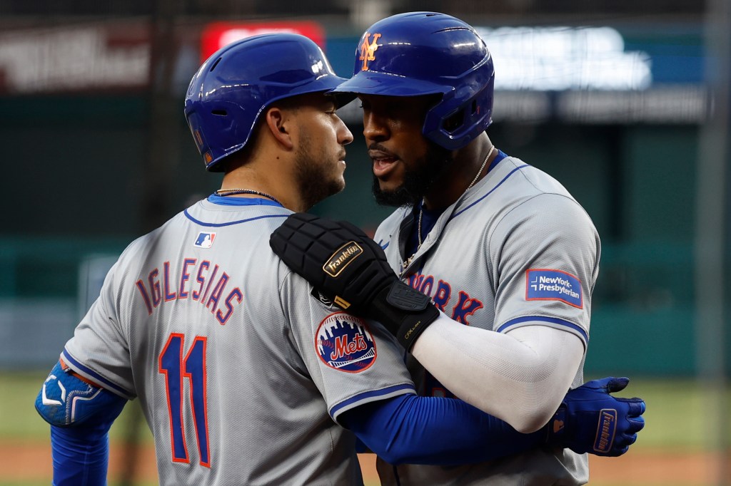 Jose Iglesias (left), who went 1-for-4, congratulates Starline Marte who scored a run in the fifth inning of the Mets' win over the Nationals.