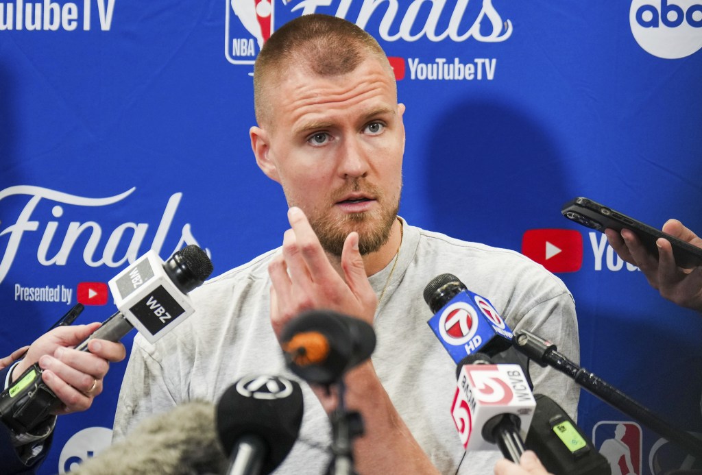 Celtics big man Kristaps Porzingis talks to the media before Wednesday's Game 3 against the Mavericks in Dallas.