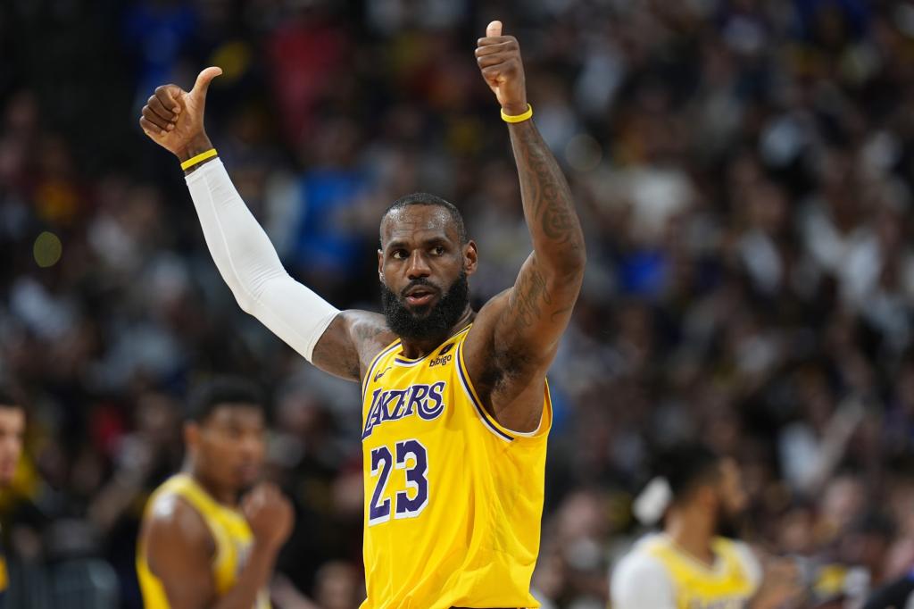 LeBron James gesturing for a call during a Lakers vs Nuggets NBA playoff game