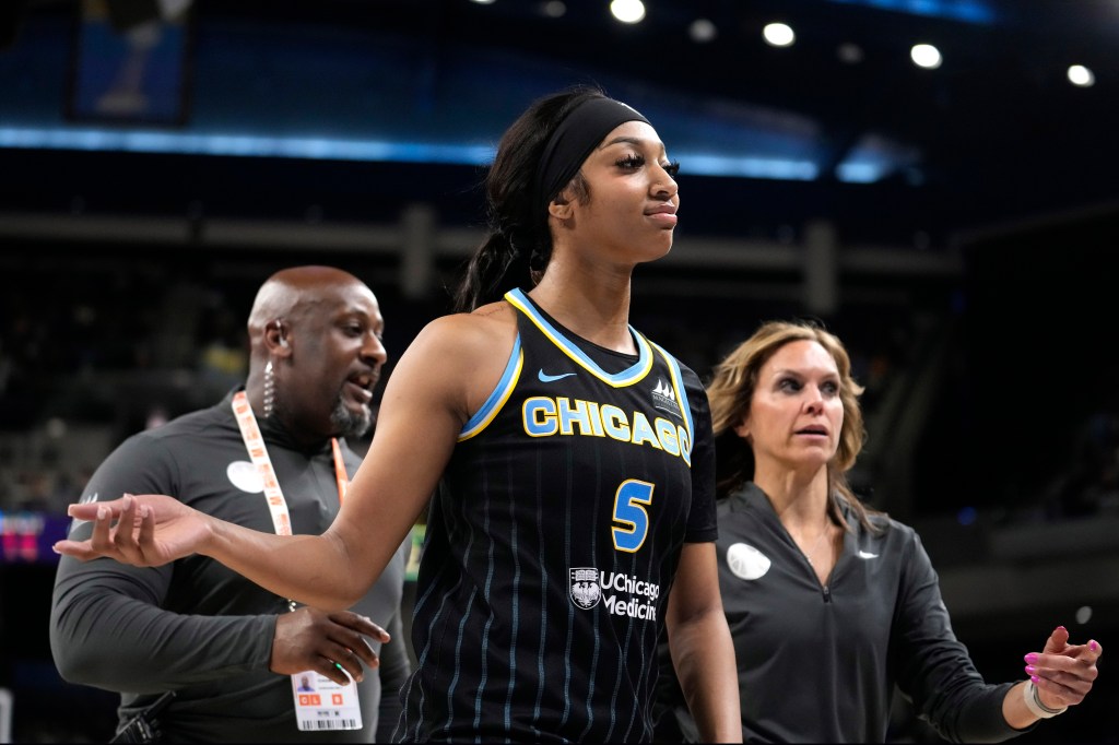 Angel Reese of the Chicago Sky heading to the locker room after being ejected from a WNBA game against the New York Liberty