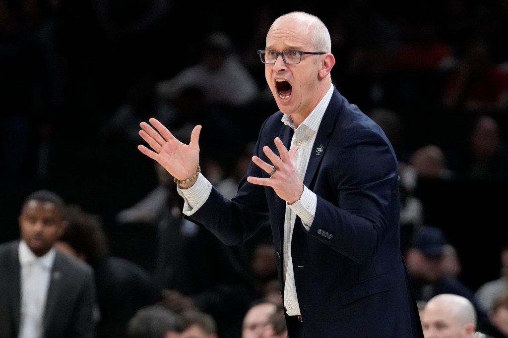 UConn head coach Dan Hurley calls towards his players during the first half of the Elite 8 college basketball game against Illinois in the men's NCAA Tournament, Saturday, March 30, 2024, in Boston.