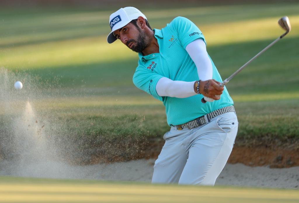 Matthieu Pavon, who is in a three-way tie for second place, hits out of greenside bunker on the 16th hole during the third round of the U.S. Open.