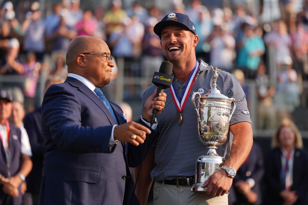 NBC golf announcer Mike Tirico interviews U.S. Open champion Bryson DeChambeau.