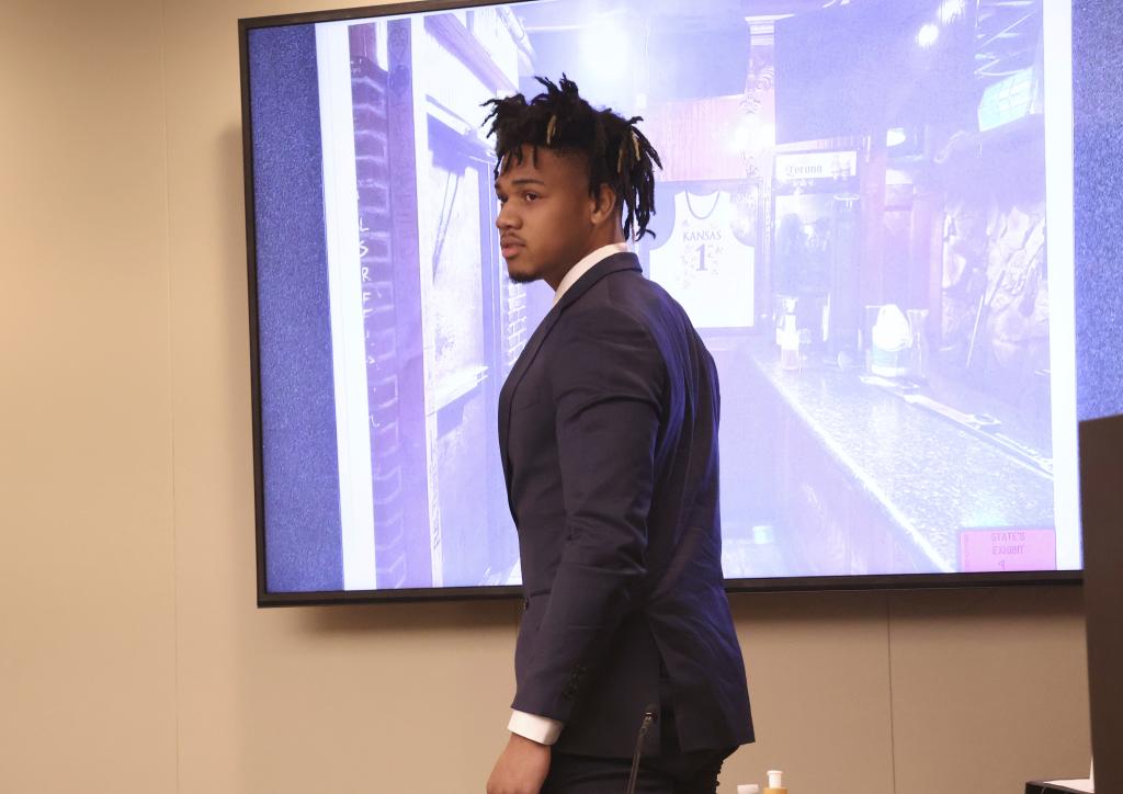 University of Illinois basketball standout Terrence Shannon Jr. refers to a photo of the Martini Room, a bar in the Jayhawk Cafe, while testifying during his trial Thursday June 13, 2024, in Lawrence, Kan.