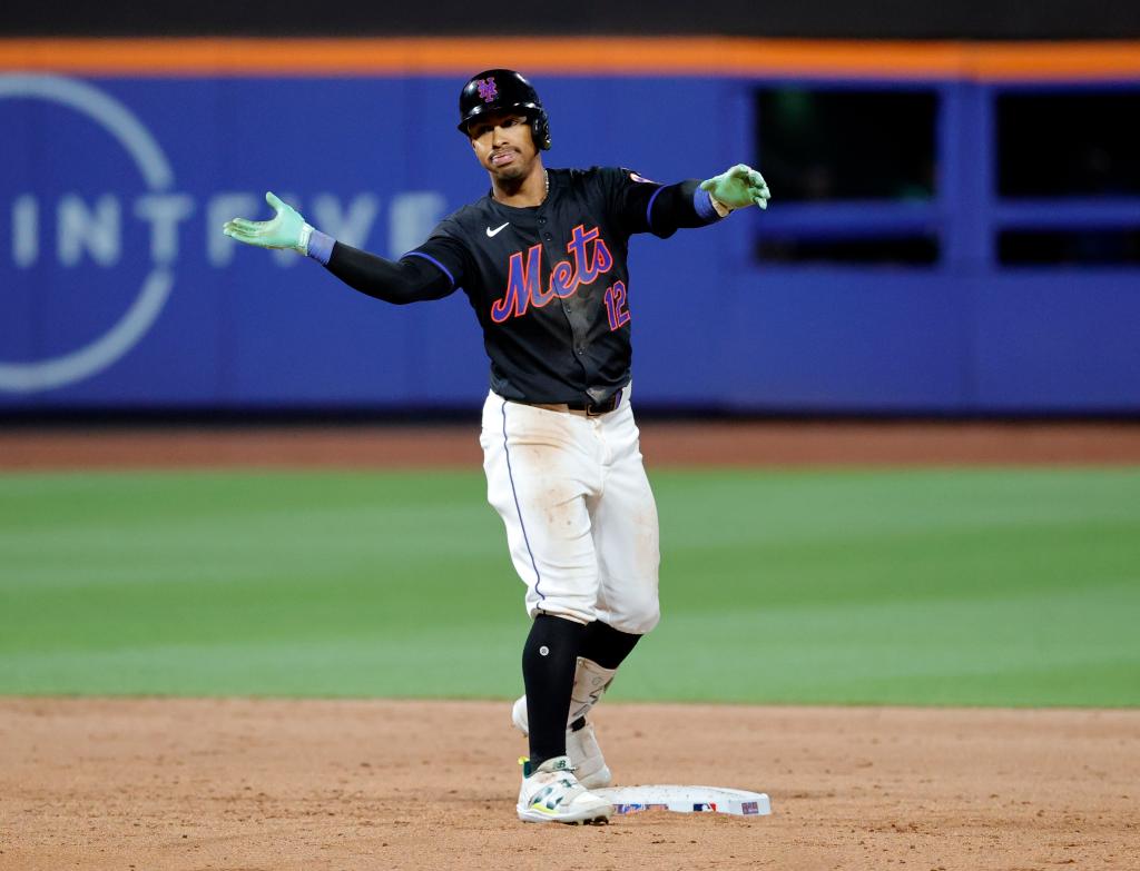 Francisco Lindor reacts after his RBI double in the eighth inning