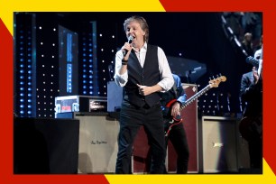 Paul McCartney sings in concert.