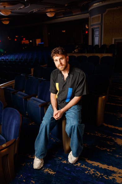 Platt posing in the theater ahead of his "Ben Platt: Live at the Palace" shows.