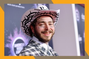 Post Malone smiles while wearing a cowboy hat.