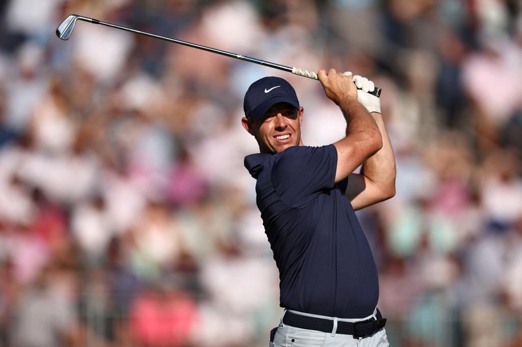 Rory McIlroy, hitting a tee shot on the 13th hole, is tied for second place heading into the final round of the U.S. Open.