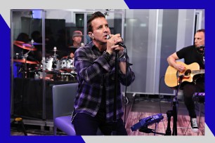 Creed frontman Scott Stapp sings in the studio with his band behind him.