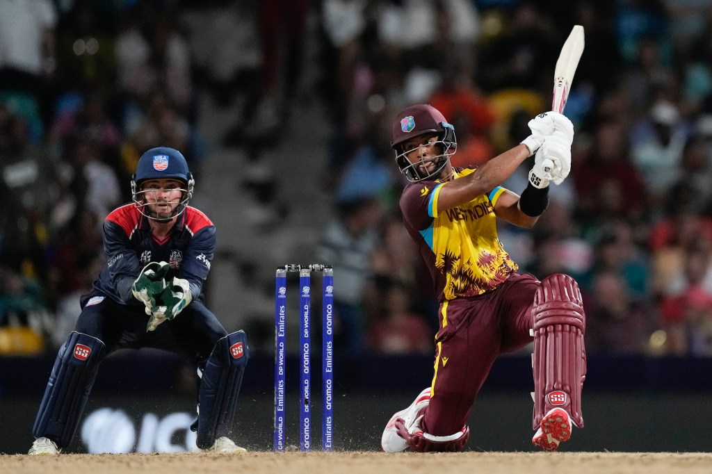 Shai Hope hits a six for the West Indies during their win over the United States in the men's T20 World Cup cricket match.