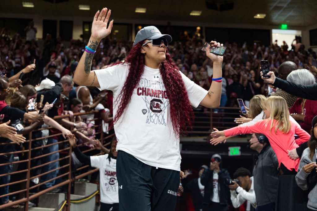 Kamilla Cardoso and the South Carolina women's basketball team entering Colonial Life Arena after winning the NCAA championship