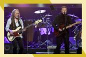 Eagles members Timothy B. Schnit (L) and Don Henley perform together.