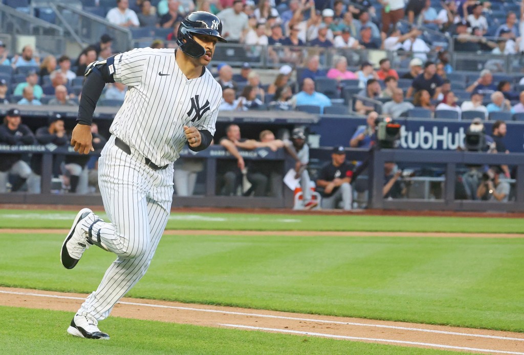 Trent Grisham rounds the bases after hitting a two-run homer in the first inning of the Yankees' win.