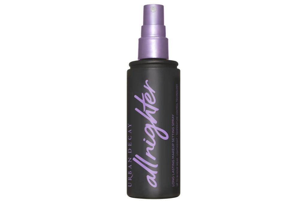 A bottle of setting spray from Urban Decay with the words 'all nighter' written in script on the front.