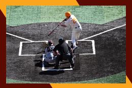 A Tennessee Vols player swings while a Texas A&M catcher awaits the pitch.