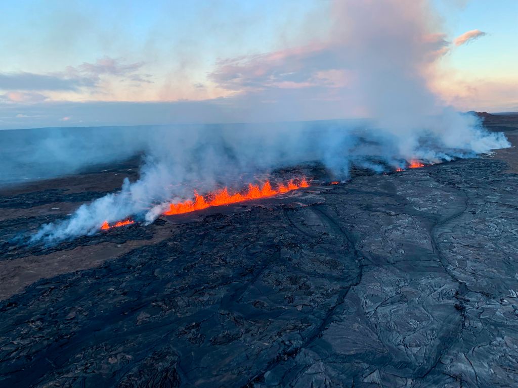 Lava began shooting up from fissures in the mountainside about 2.5 miles southwest of the caldera early Monday