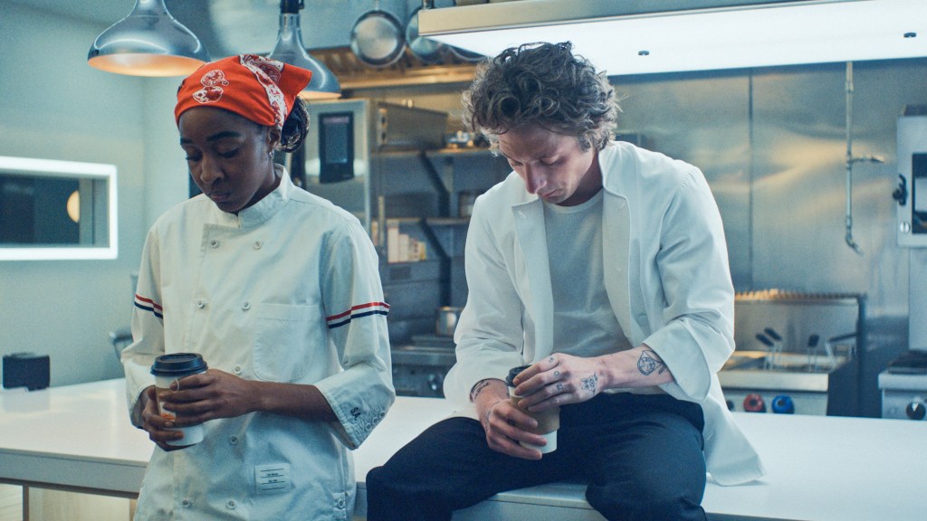 Jeremy Allen White as Carmen Berzatto, Ayo Edebiri as Sydney Adamu. 