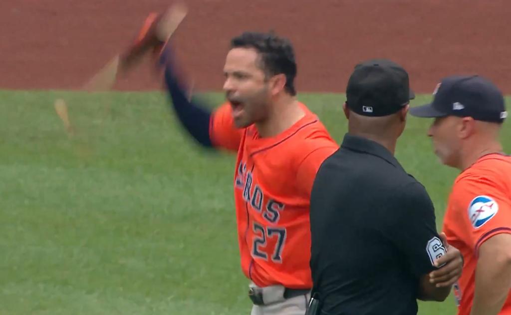 Jose Altuve slams his bat down while arguing a call in the seventh inning on Sunday.