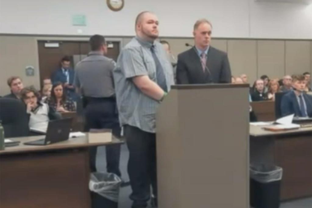 Anderson Aldrich, the Club Q shooting suspect, standing at a podium in court pleading guilty to 5 murders and 50 federal hate crimes