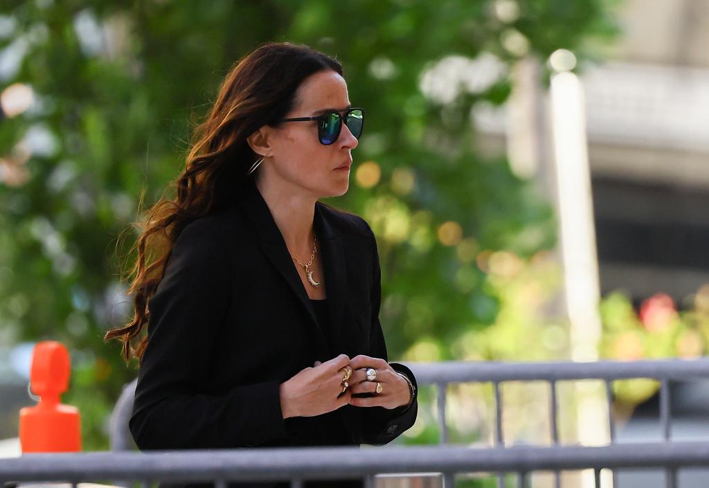 Ashley Biden wearing sunglasses and a black jacket, arriving at the J. Caleb Boggs Federal Building in Wilmington, Delaware for Hunter Biden's trial