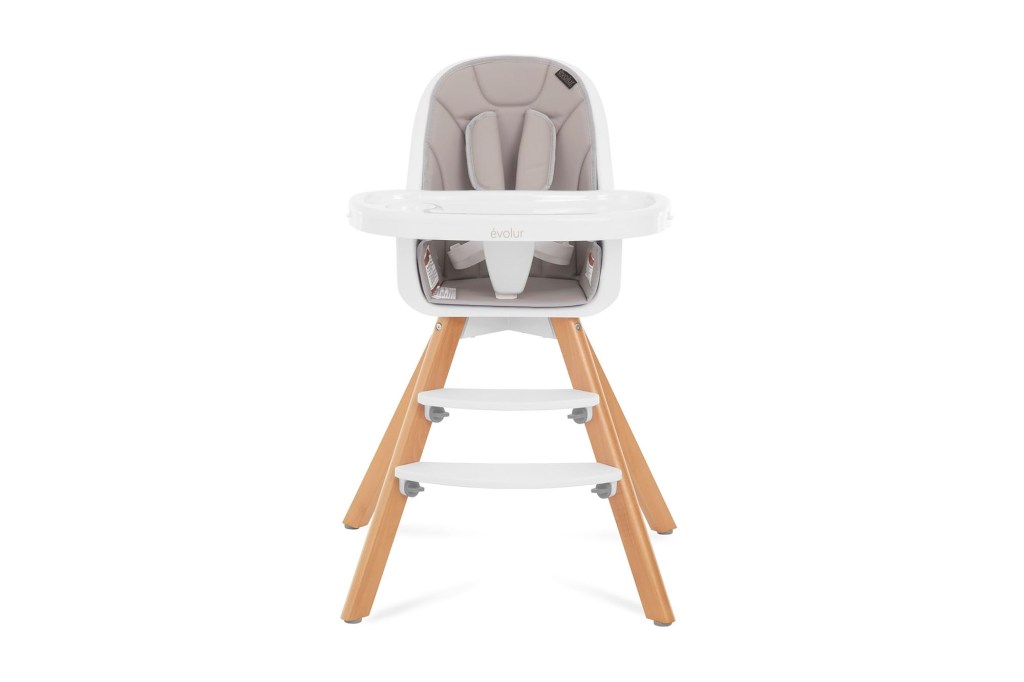 A baby high chair with a seat and steps