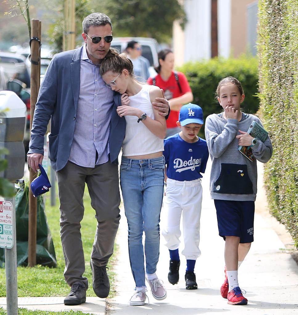 Ben Affleck walks down the street wtih his children, Seraphina, Samuel and Violet.