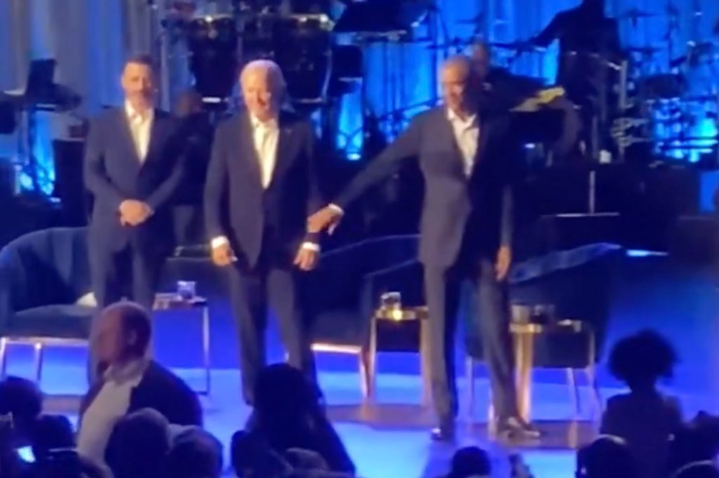 President Biden is seen being led offstage by President Obama during a star-studded fundraiser in LA Saturday night.