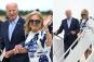 Grimacing Biden clutches Jill's arm after touching down in Hamptons for ritzy fundraiser amid growing calls to step down