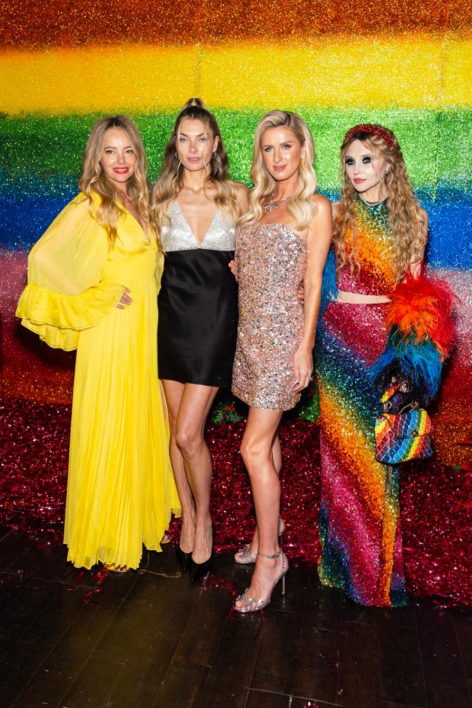 Bijou Phillips, Jessica Hart, Nicky Hilton, and Stacey Bendet posing at the alice + olivia Pride Party in New York City, June 2024.