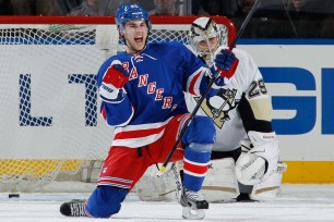 Derick Brassard #16 of the New York Rangers celebrates his goal in the second period against Marc-Andre Fleury #29 of the Pittsburgh Penguins at Madison Square Garden on April 3, 2013 in New York City.