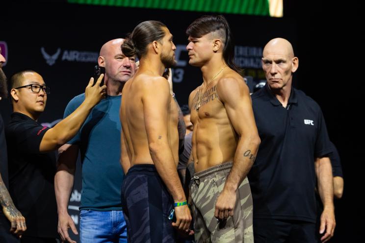 Brian Ortega (left) faces off with Diego Lopes during weigh ins for UFC 303 at T-Mobile Arena.
