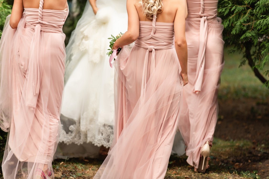 Dusty pink was going to be worn by all bridesmaids, so the bride did not want any guests to match. 