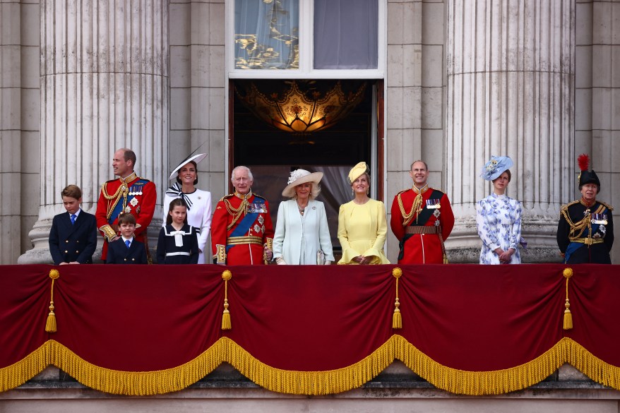 Britain's King Charles III (C-L) and Britain's Queen Camilla (C-R) stand with (L-R) Britain's Prince George of Wales, Britain's Prince William, Prince of Wales, Britain's Prince Louis of Wales, Britain's Catherine, Princess of Wales, Britain's Princess Charlotte of Wales, Britain's Sophie, Duchess of Edinburgh, Britain's Prince Edward, Duke of Edinburgh, Britain's Lady Louise Windsor and Britain's Princess Anne, Princess Royal, on the balcony of Buckingham Palace