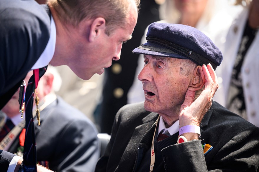 Prince William speaks with a D-Day veteran in Portsmouth, UK.