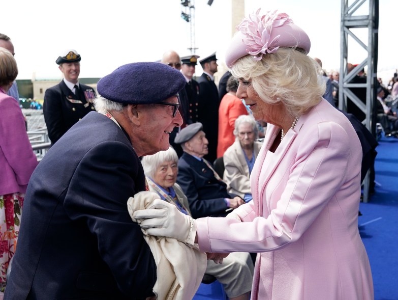 Queen Camilla meets Royal Navy serviceman Eric Bateman, who moved her to tears recalling his experience on Utah beach.