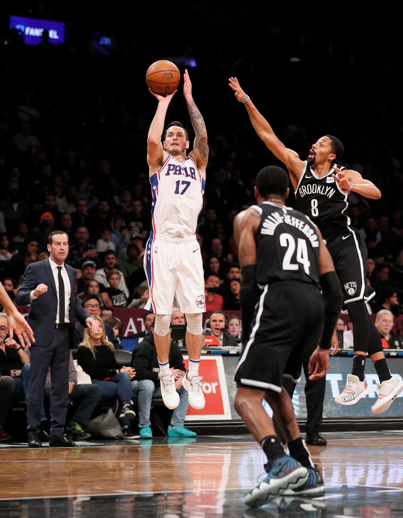 JJ Redick hits a shot for the 76ers against the Nets in 2018.