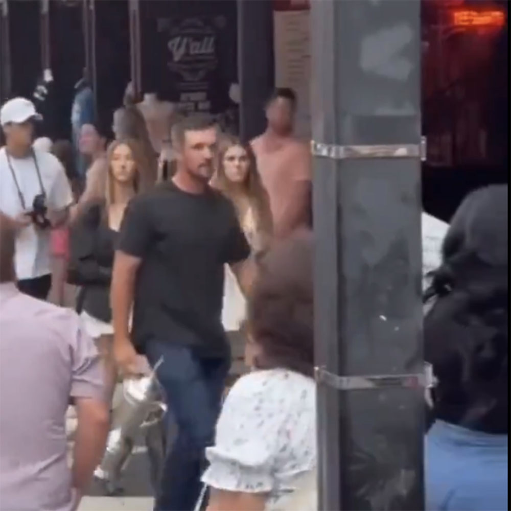 Bryson DeChambeau carries his U.S. Open trophy to Jason Aldean's Kitchen + Rooftop Bar in Nashville, where he attended a LIV Golf Event on June 20, 2024.